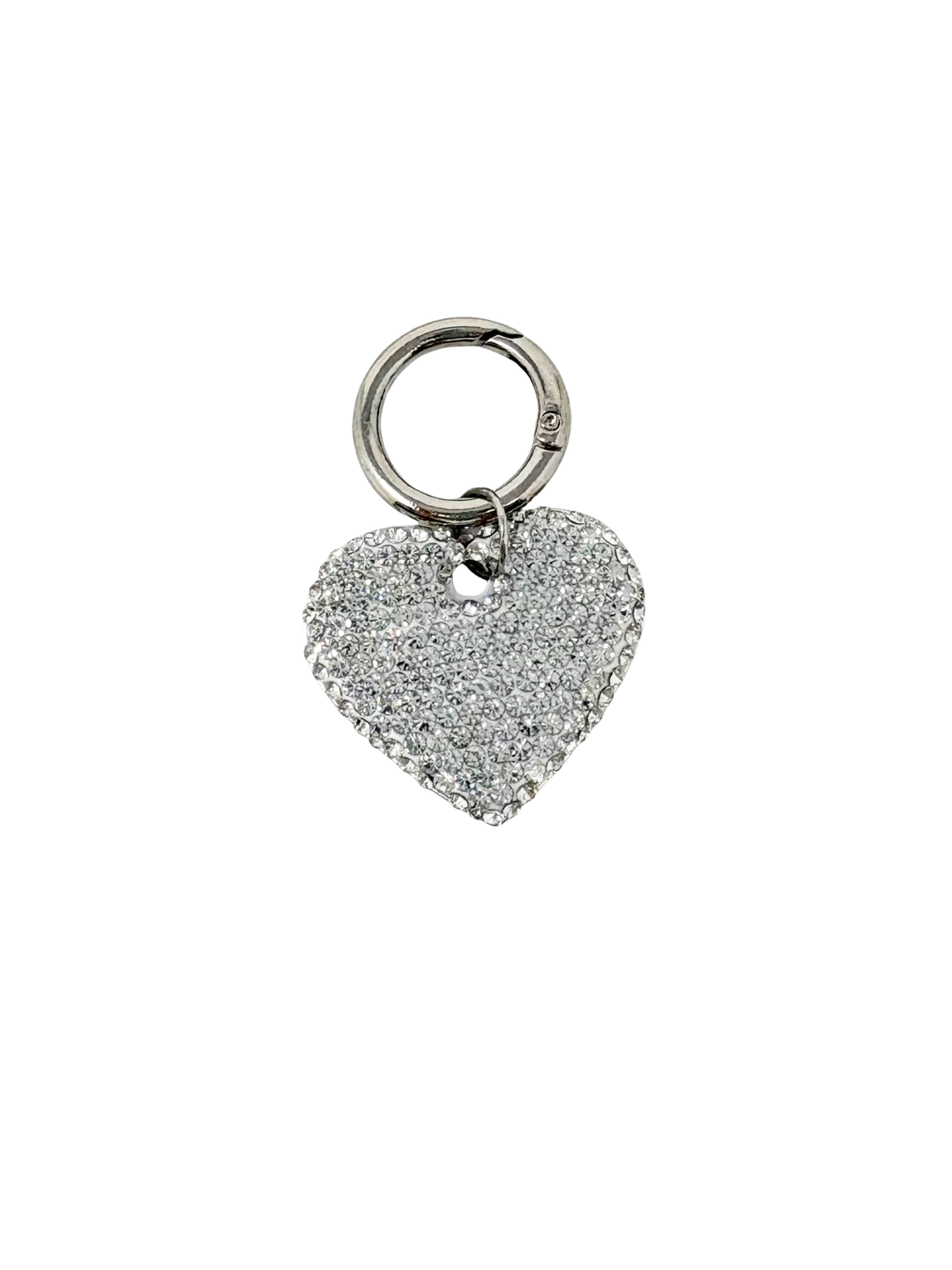 Heart-shaped silver dog tag covered in shimmering rhinestones with a circular metal clasp.
