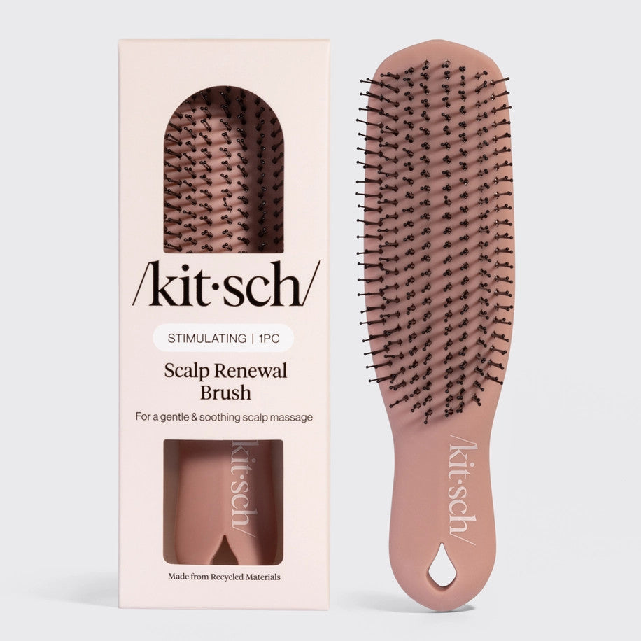 Terracotta Scalp Renewal Brush with multi-level bristles and ergonomic handle