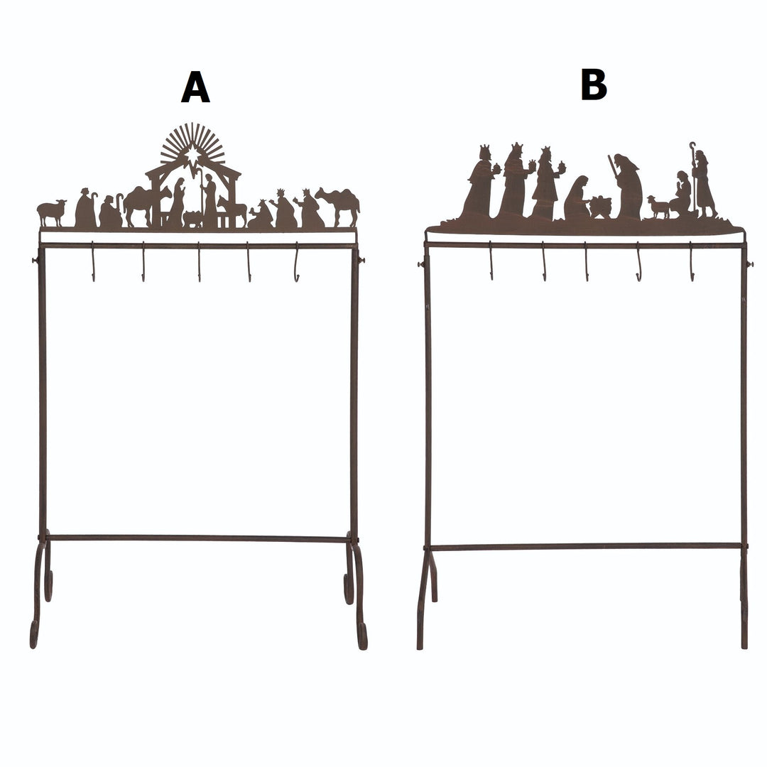 Metal nativity stocking holder featuring a creche scene with figures in silver finish.
