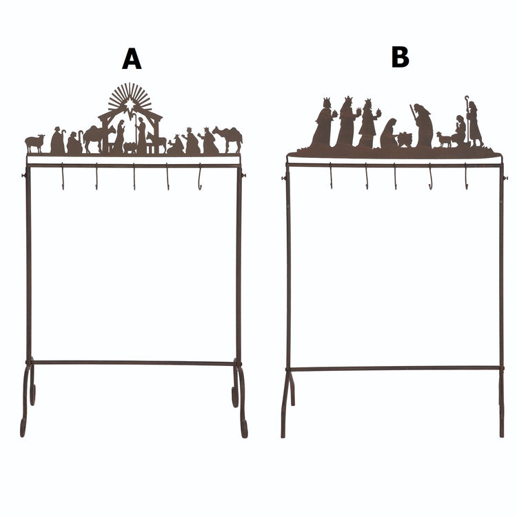 Metal nativity stocking holder featuring a creche scene with figures in silver finish.