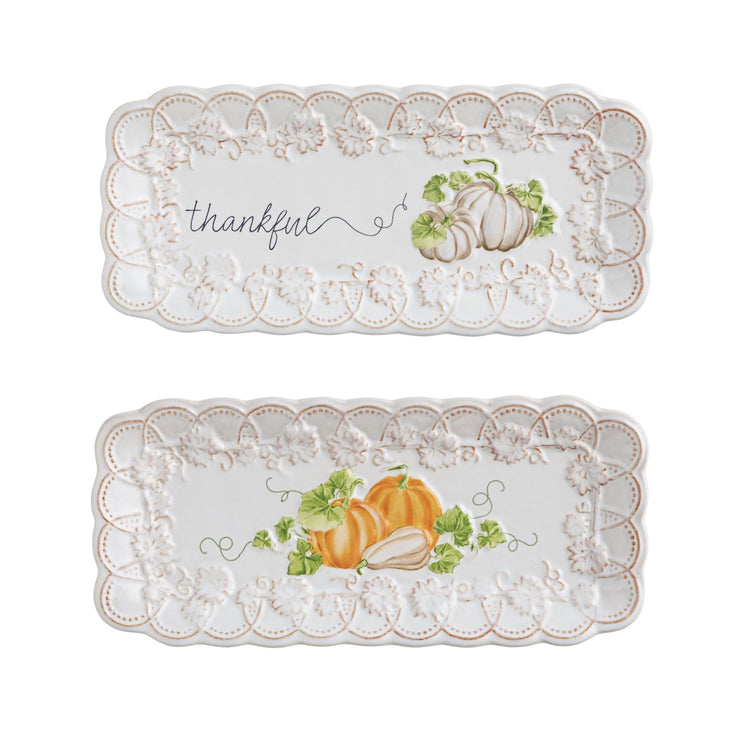 Two white stoneware Gather Everything Plates with scalloped edges, pumpkins, and 'thankful' script.