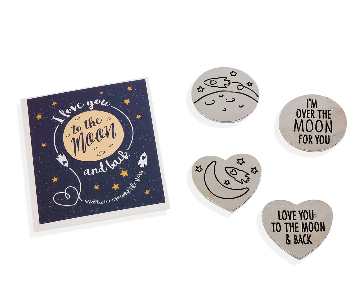 Moon Sentiment Token pendant in silver with a heart-shaped moon face engraved on the front.