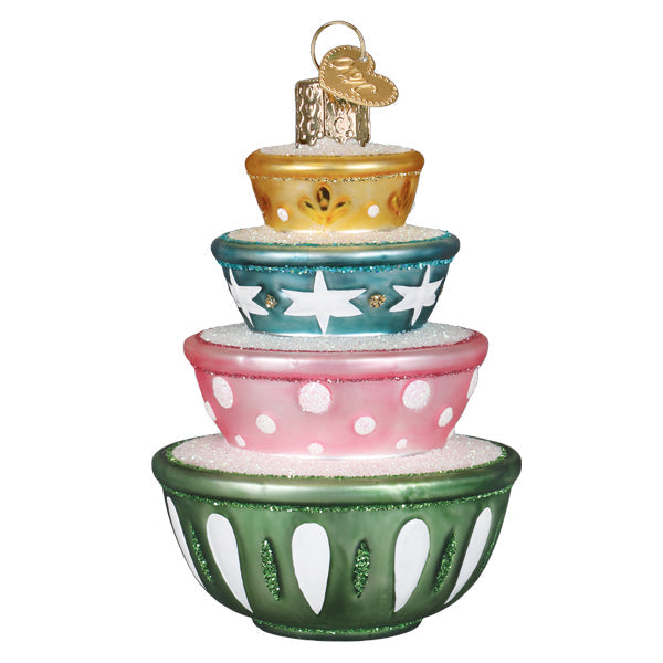 Stacked ceramic mixing bowl ornaments in cheerful holiday colors with a glossy finish.