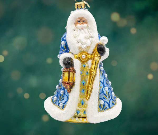 Gilded Grandeur Santa ornament: gold metallic finish with red velvet trim on a classic silhouette.