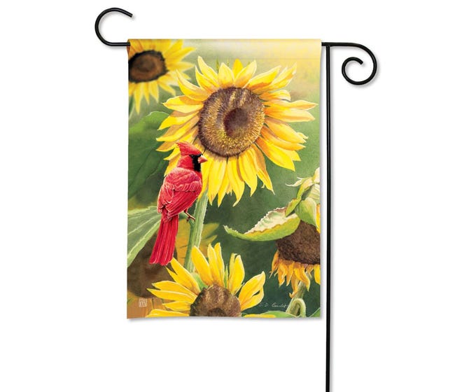 Garden flag with a cardinal perched on a sunflower stalk, surrounded by sunflowers.