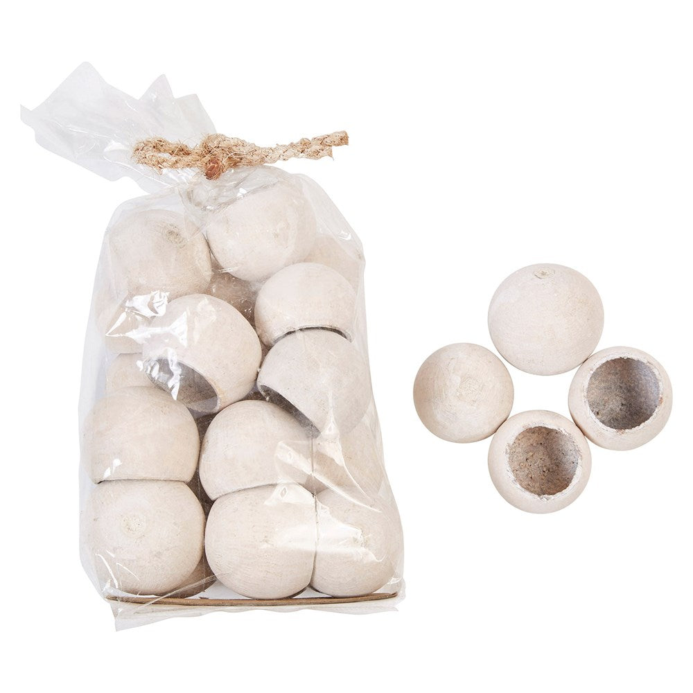 Bag containing dried natural bell-shaped flowers with a neutral color palette.