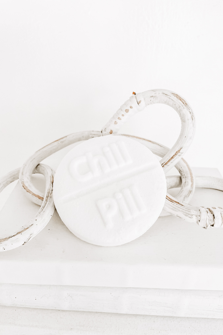Chill Pill Bath Fizz bath fizz in a round container with cool citrus and musk scent notes.