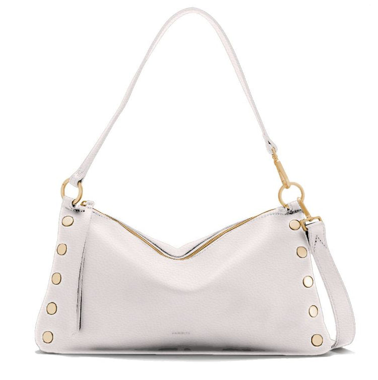 Kyle Med crossbody bag in white leather with brushed gold hardware, featuring red piping and a vertical back cell pocket.