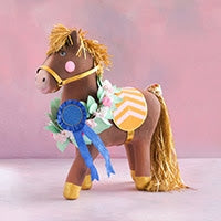 34.5-inch Glitterville Gallop the Horse display figure with a blue ribbon and floral wreath.