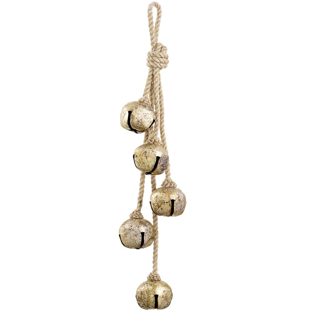 Five antique gold jingle bells hanging from a natural jute rope ornament.