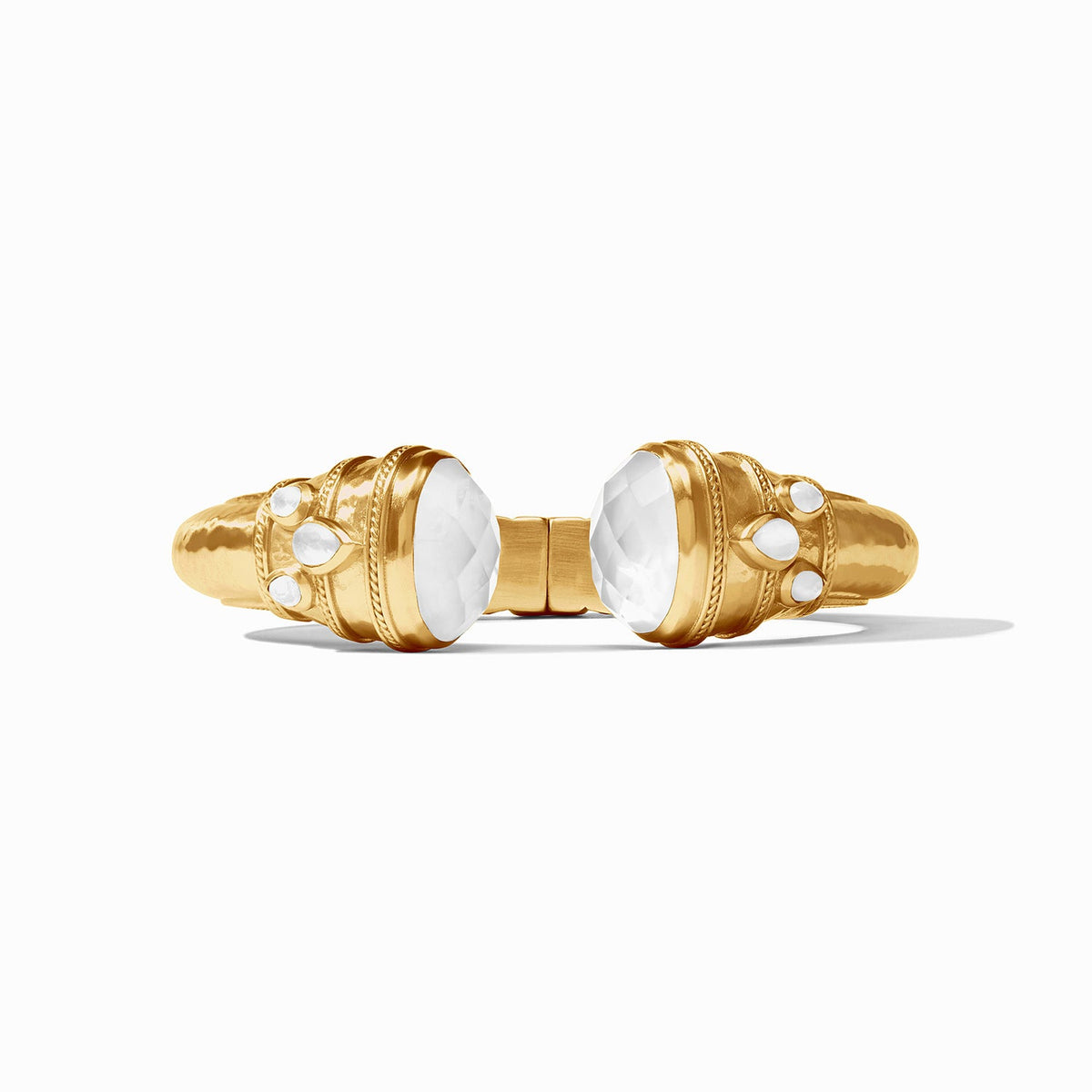 Gold cuff bracelet with rose-cut endcaps, pear gemstones, freshwater pearl, and mother-of-pearl accents.