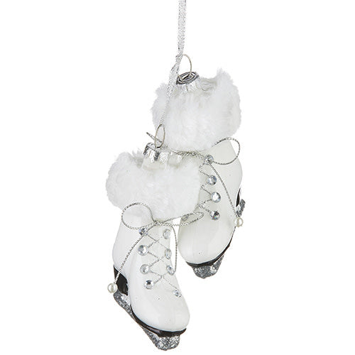 Glass ornament shaped like a pair of white ice skates with fur trim