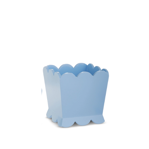 Light blue square planter with scalloped edges at the top and base.
