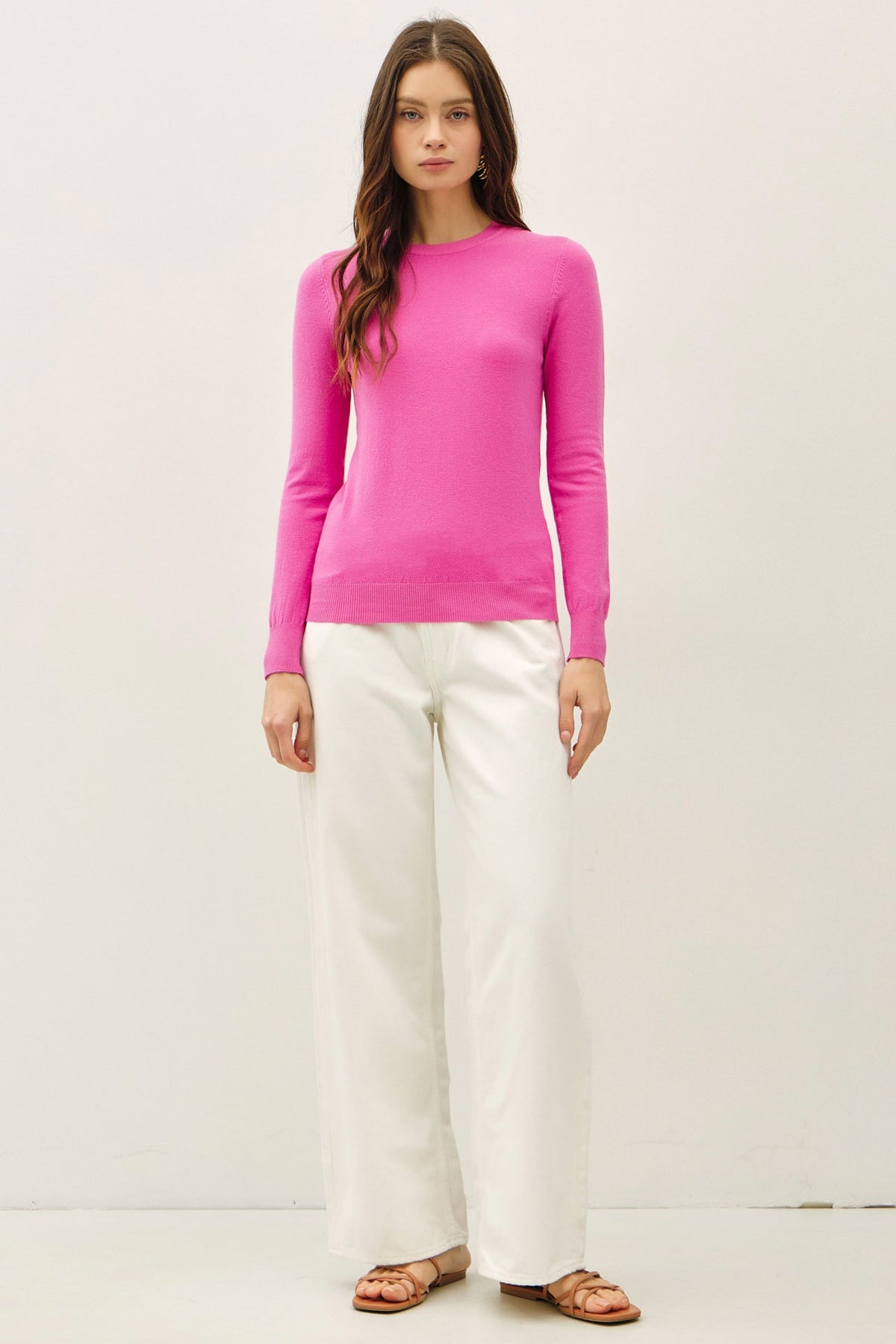 Relaxed fit Harper crew neck sweater in solid soft knit fabric with ribbed cuffs and hem.
