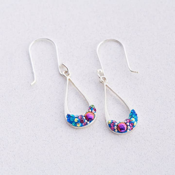 Petite long drop hoop earrings in sterling silver with colorful Austrian crystals.