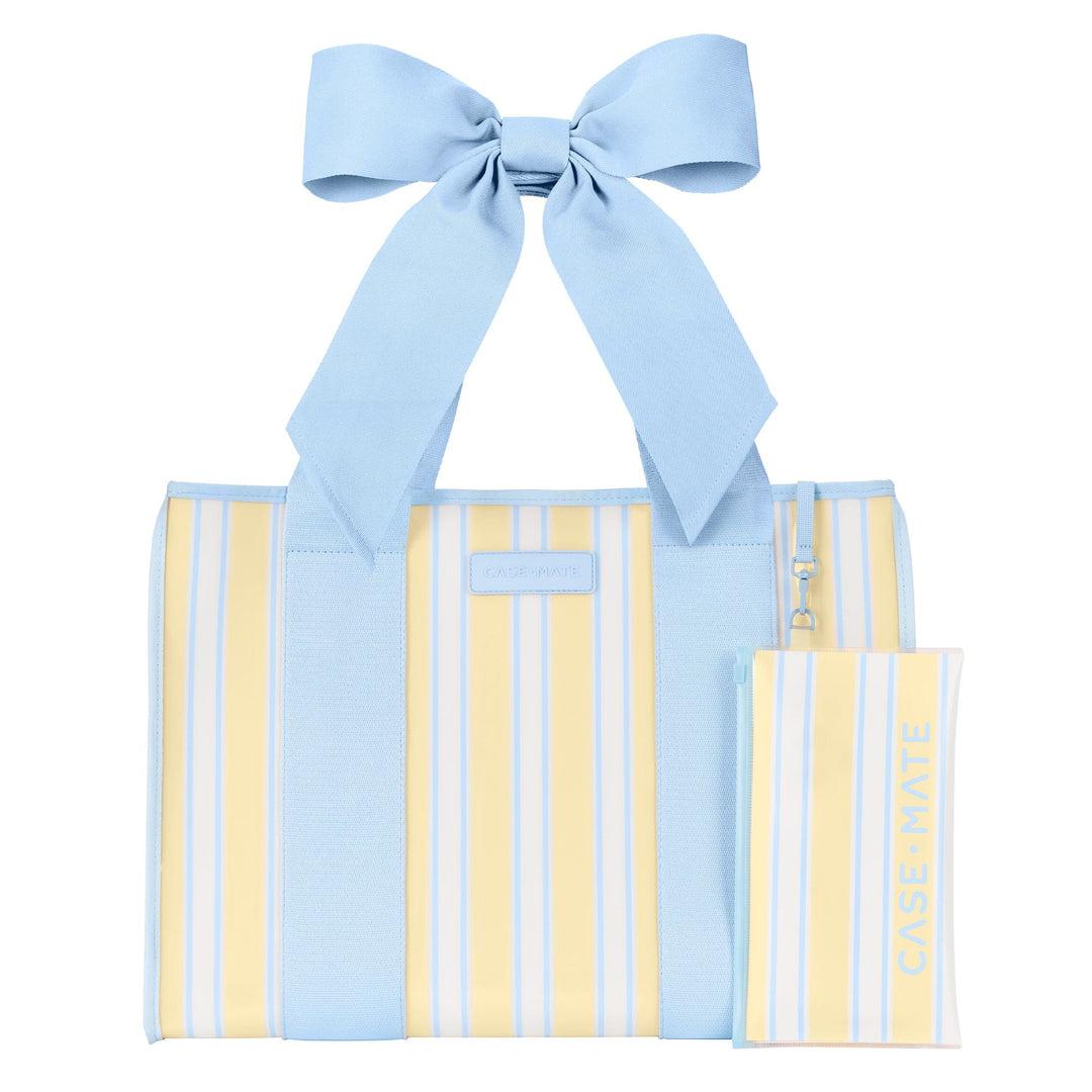 Blue and yellow striped jelly tote bag with a large blue bow and matching phone pouch.