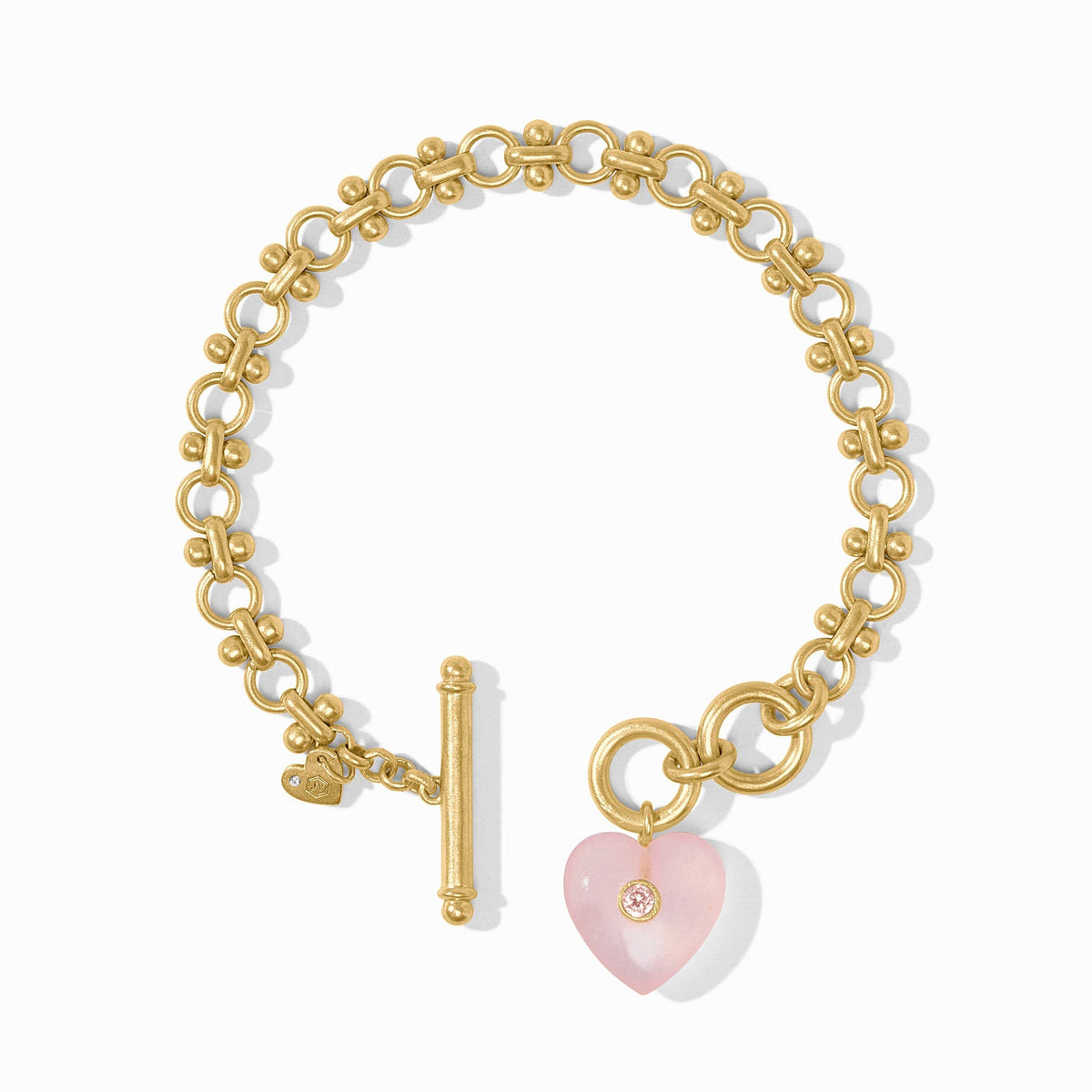 Pink quartz heart link bracelet with gold plating on a white background