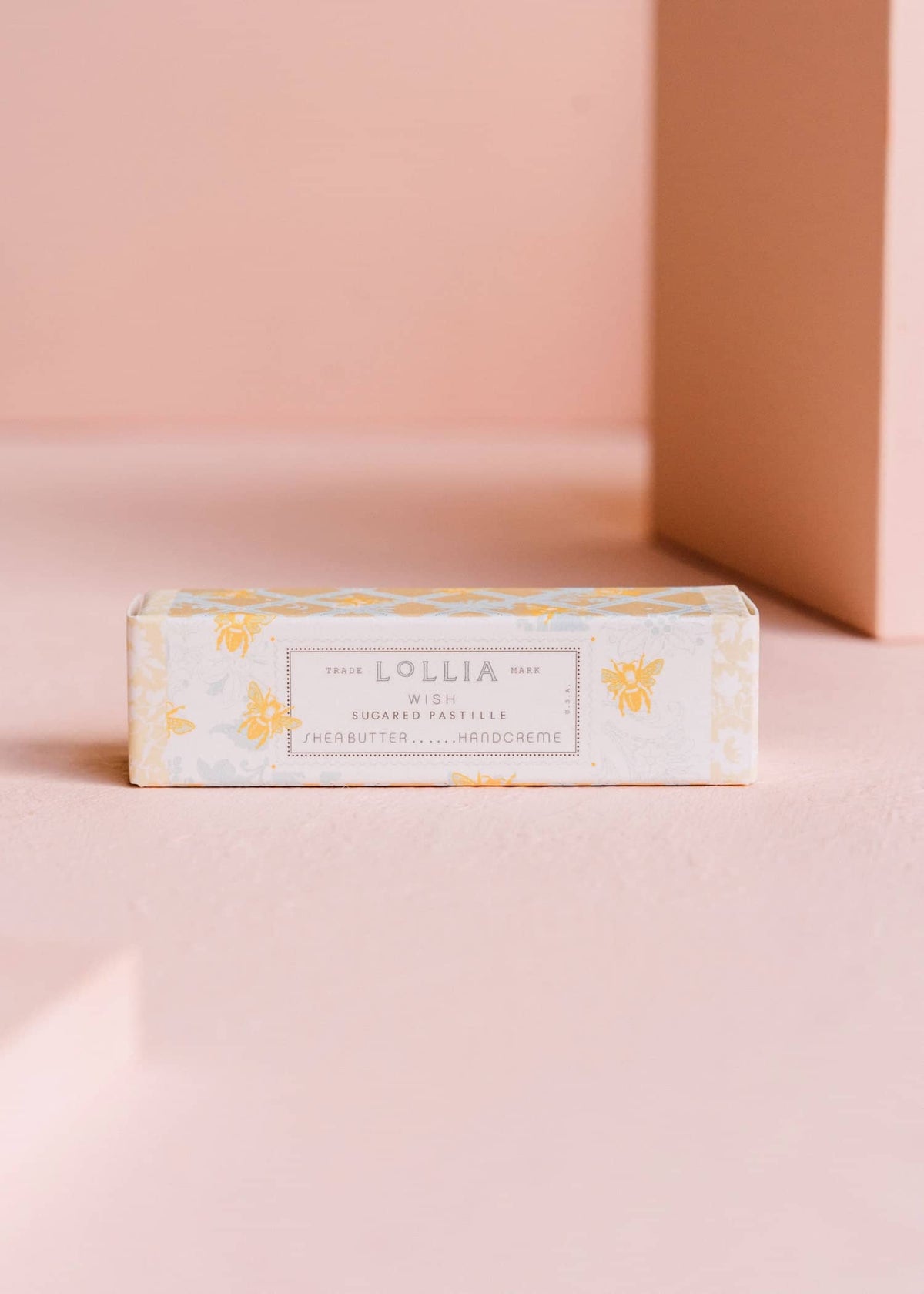 Wish Petite Treat Handcreme in a rectangular box with golden bees and blue foulard patterns.