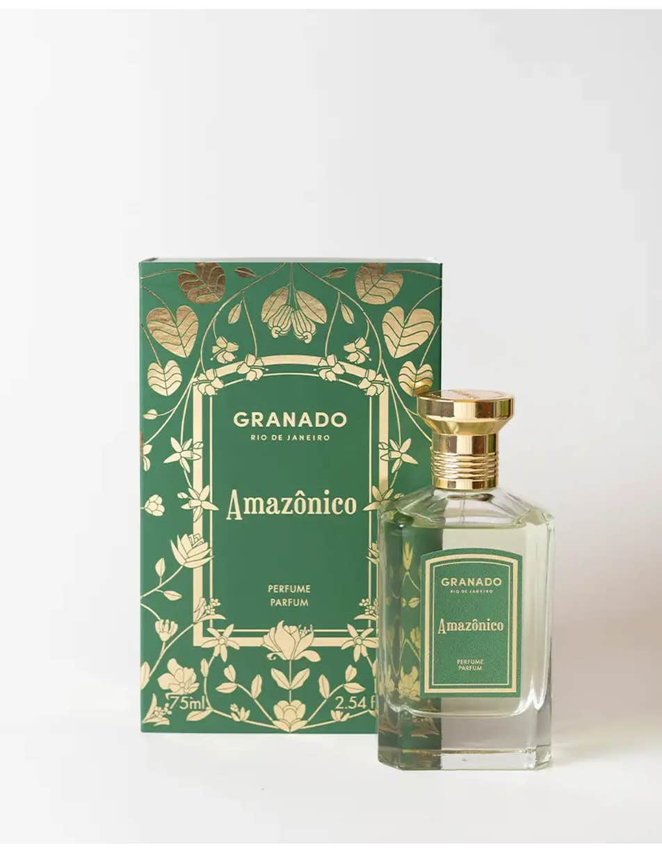 Amazônico Eau de Parfum by Granado in a 75ml glass bottle next to its green and gold floral box.