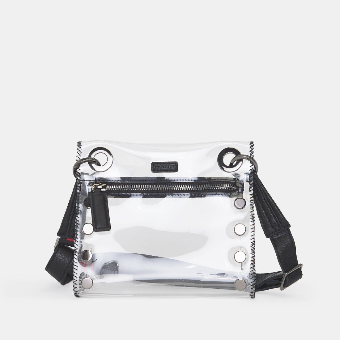 Tony Small Clear Bag with black leather strap, silver hardware, and front zipper pocket.