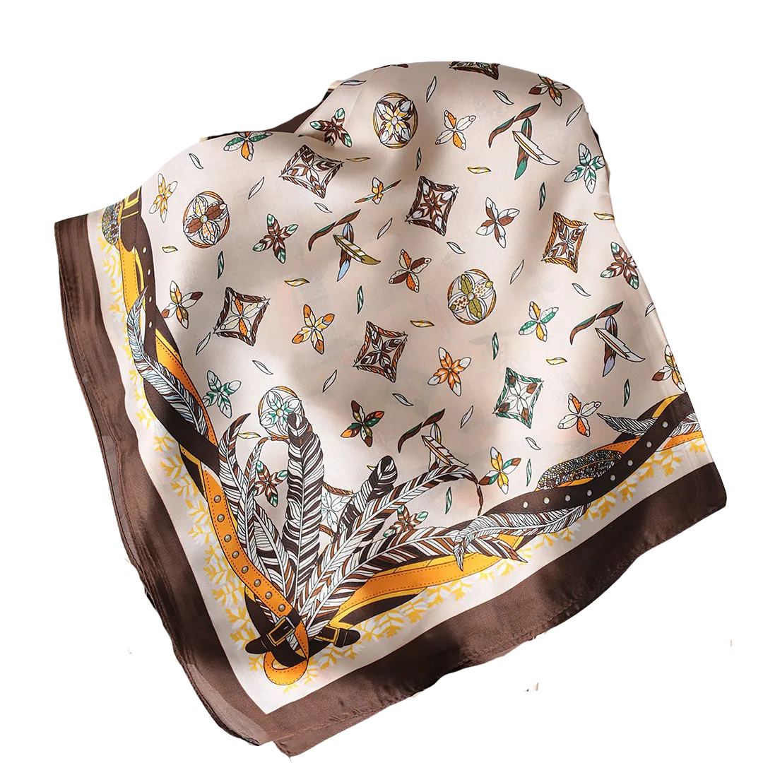 Silk square scarf with a cream center, brown border, and feather and geometric patterns.