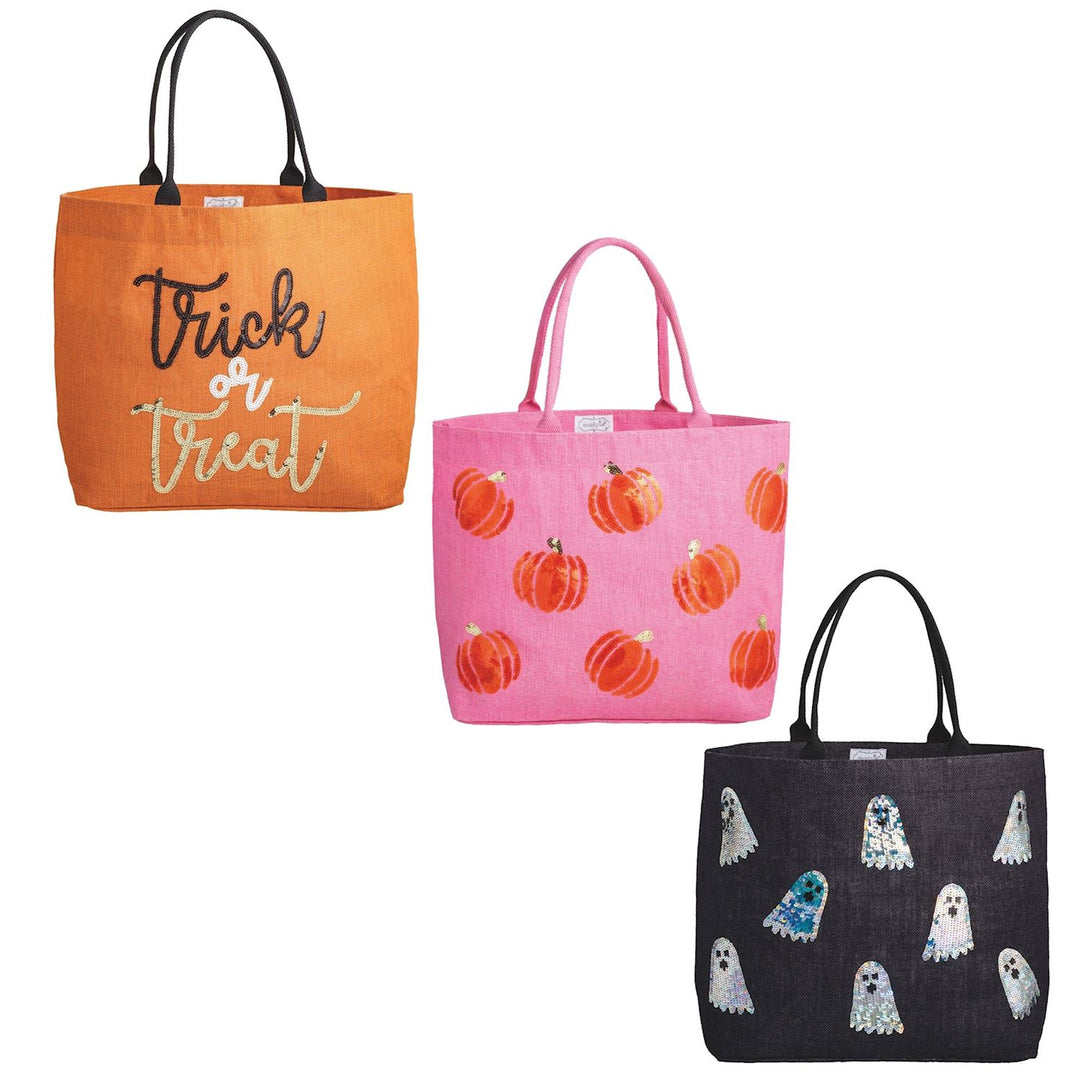 Three Halloween sparkle tote bags in orange, pink, and black with sequins and festive designs.