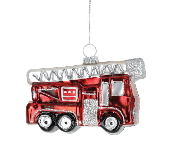 Hand blown glass fire truck ornament in red with black wheels and yellow accents.