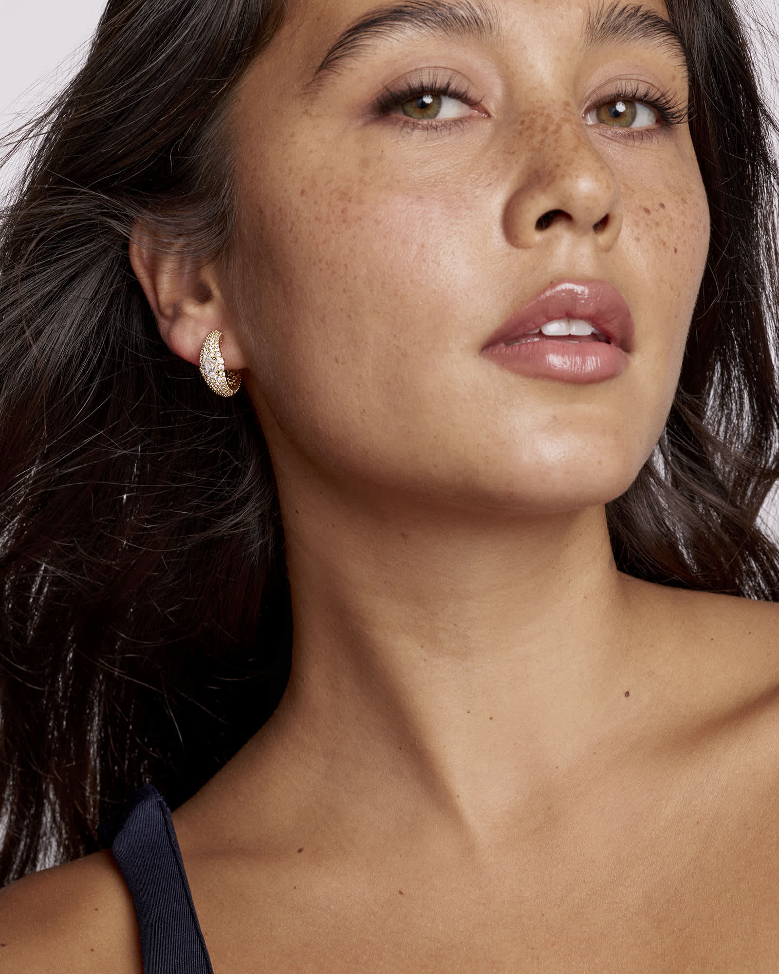 White cubic zirconia hoop earrings with ear post closure