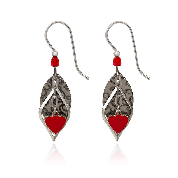 Red heart on football-shaped textured brass earrings with surgical steel earwires.