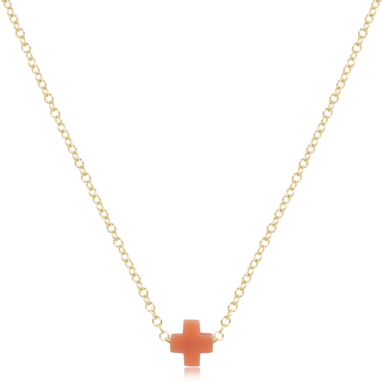 16-inch 14kt gold-filled chain necklace featuring a small coral-colored signature cross pendant.