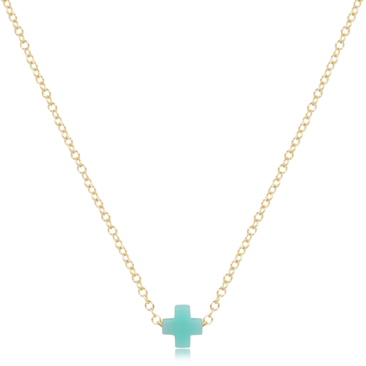 16-inch 14kt gold-filled chain necklace featuring a small turquoise-colored signature cross pendant.