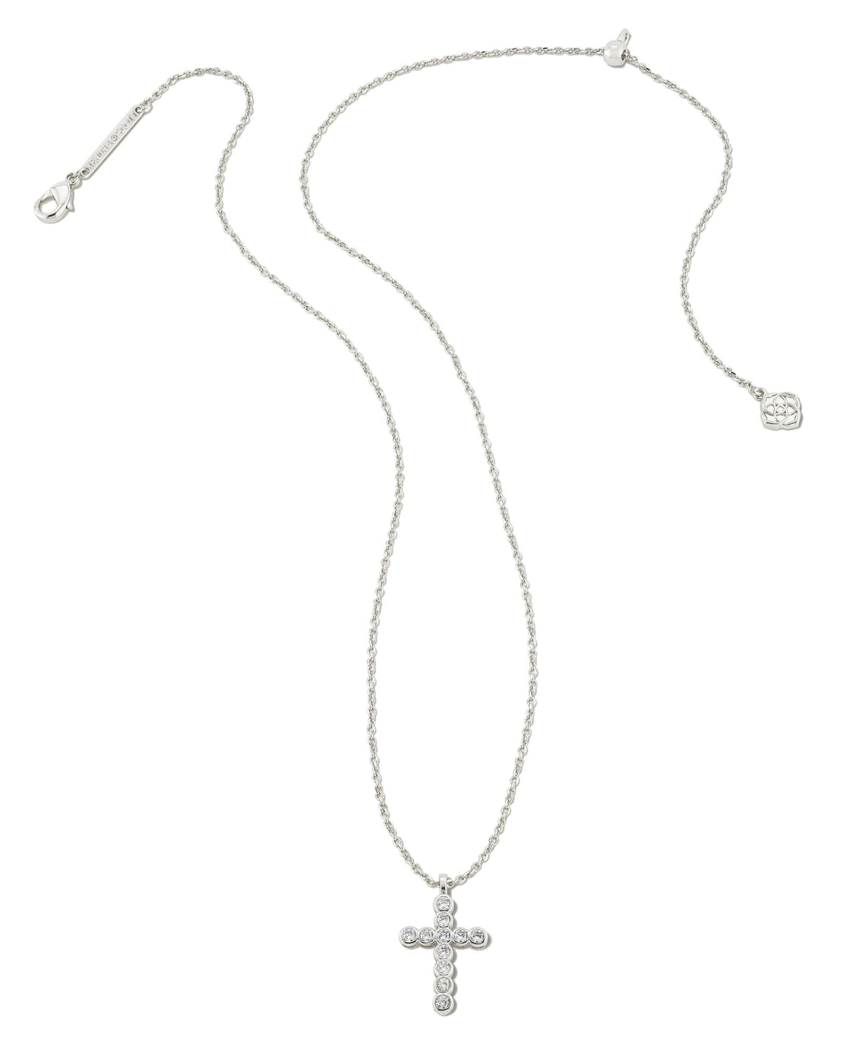 Silver cross pendant necklace with clear crystals on an adjustable chain with a lobster clasp.