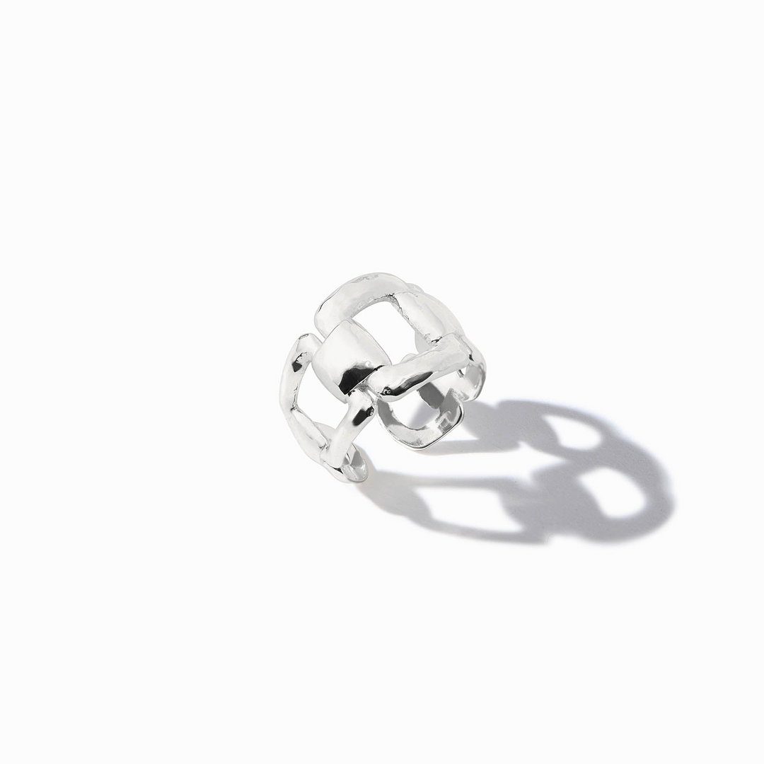 Sahara Ring Silver, a wide sterling silver band with an open, interlocking geometric design.
