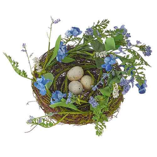 Blue polyester floral nest with ferns and eggs on twig base