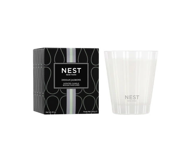 Nest Classic Candle in a clear glass jar with an off-white wax pillar.