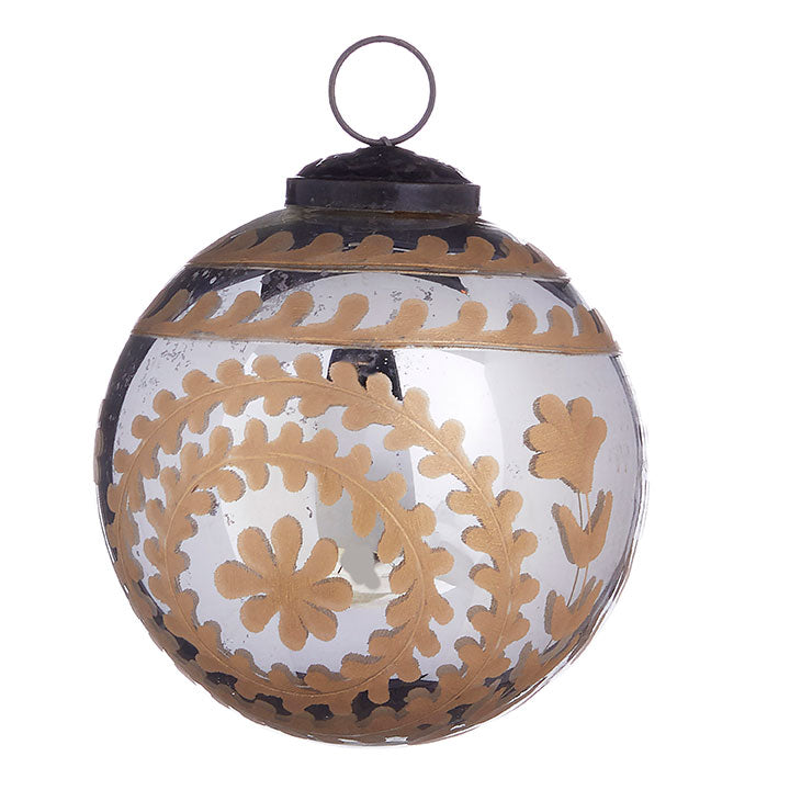 A 3.75" clear glass ornament with gold etched floral and vine patterns and a dark metal cap.