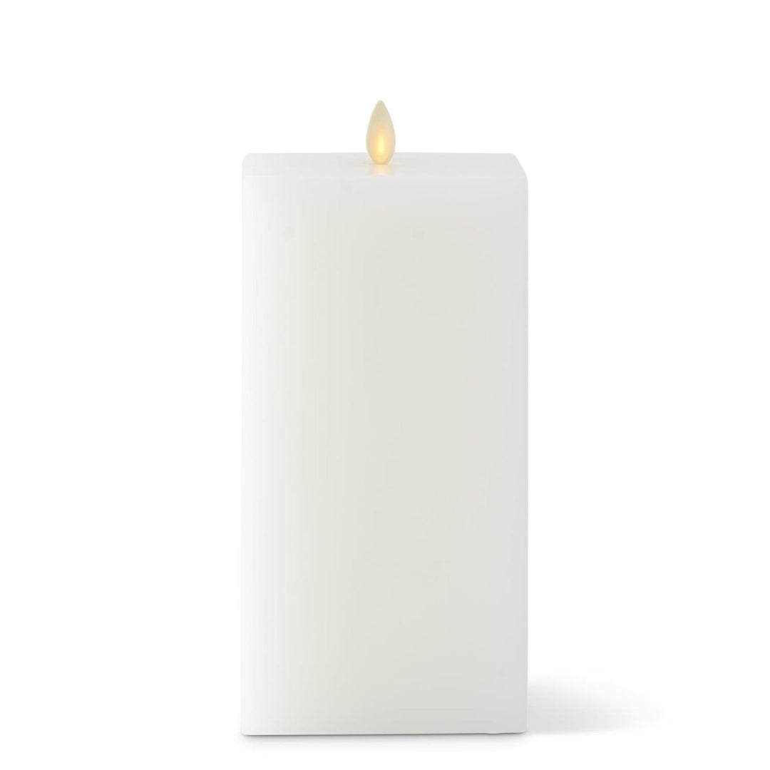 White wax Luminara indoor square flameless candle with a realistic flickering LED flame.