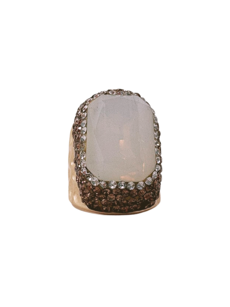 Queen of Sheba Fashion Ring featuring a large white faceted stone surrounded by brown crystals.
