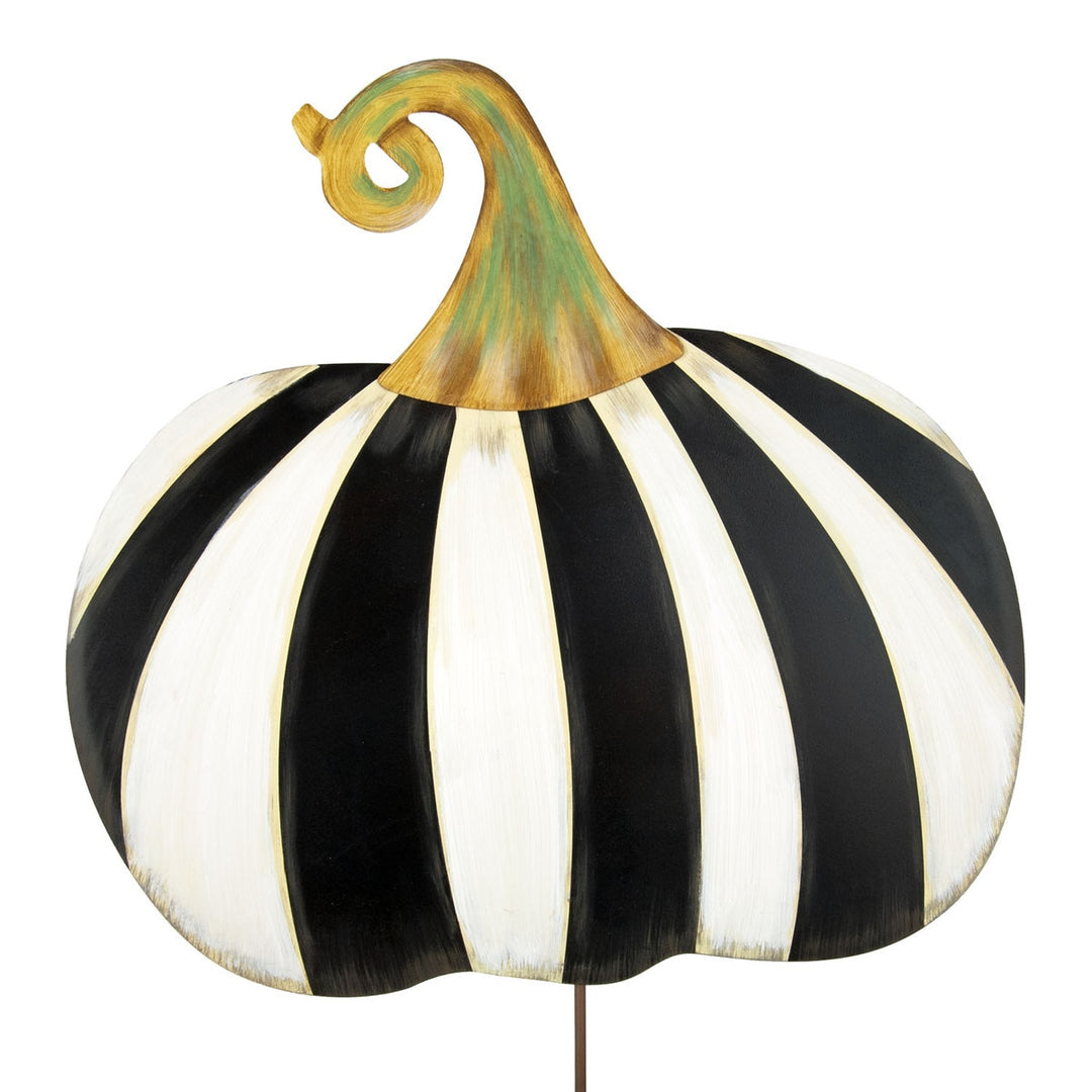 Short metal yard stake shaped like a pumpkin with black and white vertical stripes and a gold stem.