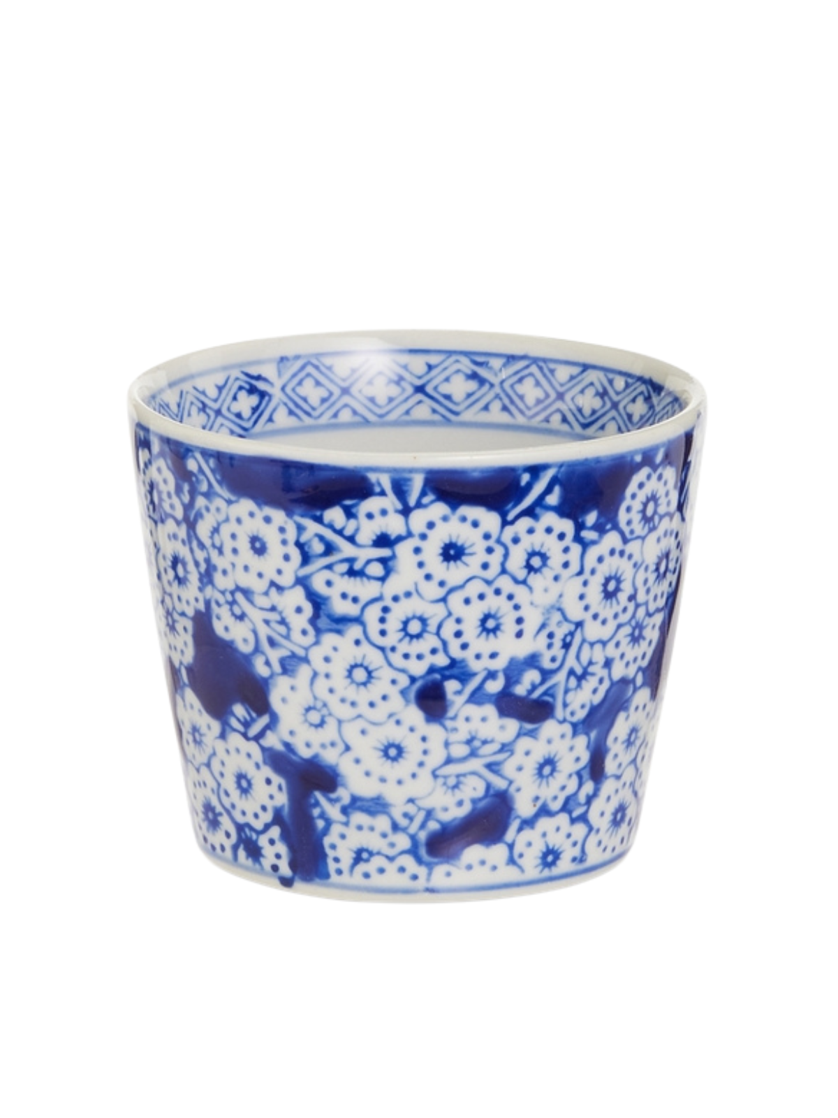3.5 inch mini blue and white ceramic pot with floral pattern and geometric rim.