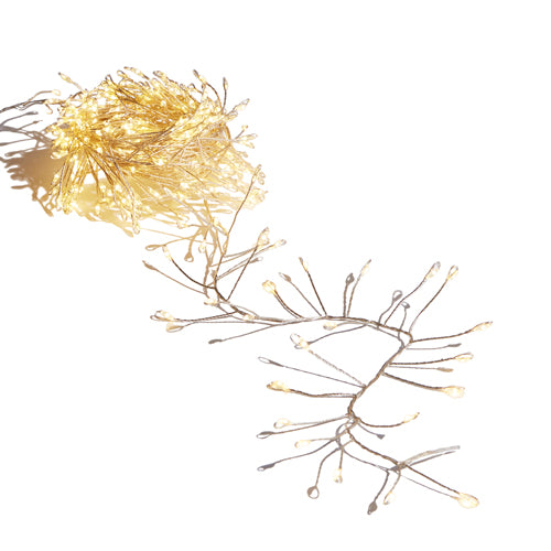 Raz fairy lights with 300 warm white LEDs on a flexible silver wire, shown coiled and extended.