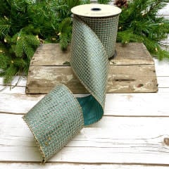4-inch wide taffeta glitter mesh ribbon in silver with a shimmering texture.