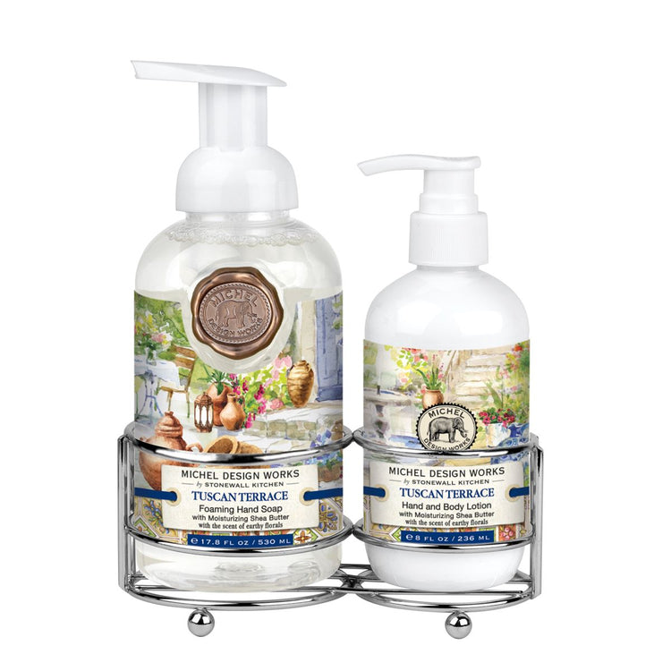 Foaming hand soap dispenser with pump next to a matching lotion bottle on a countertop.