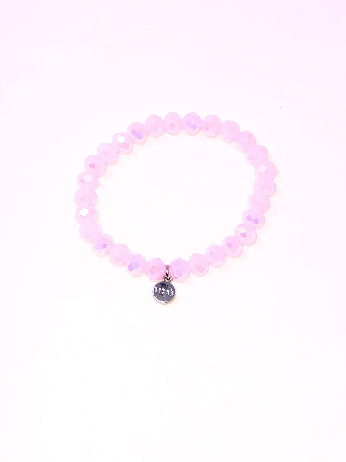 Stretchy bracelet with faceted glass beads in a colorful beaded pattern.