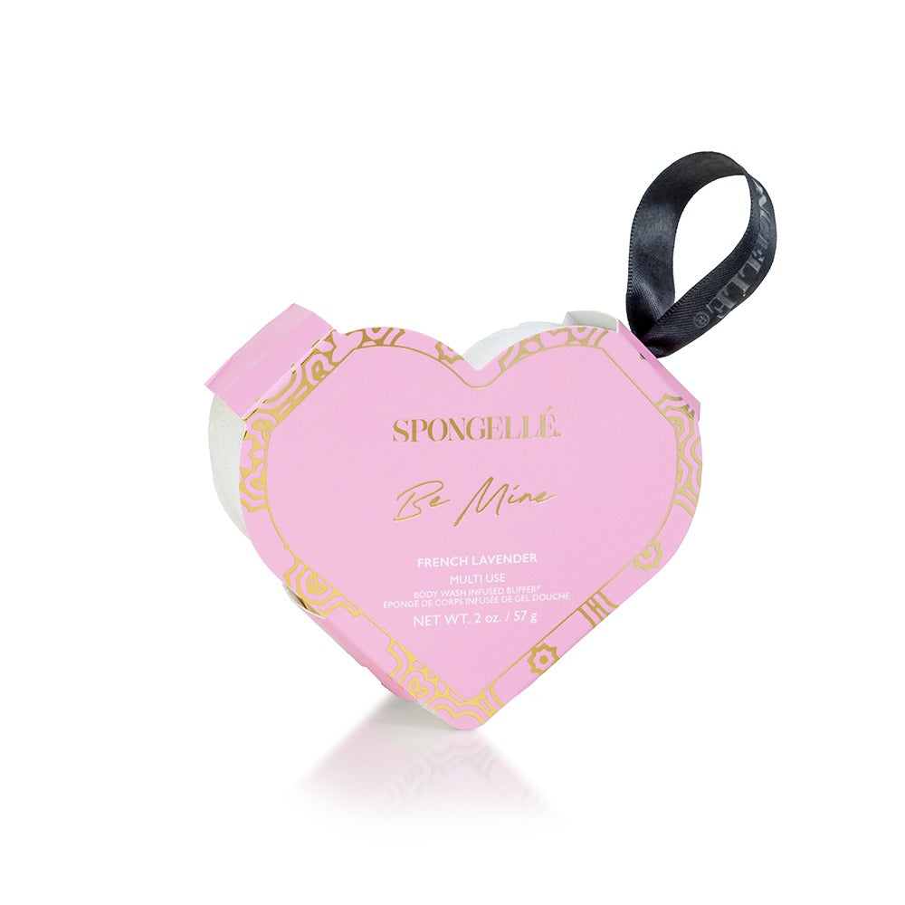 Daisy Collection heart-shaped body buffer sponge with Yuzu, Edelweiss, and Vetiver extracts.