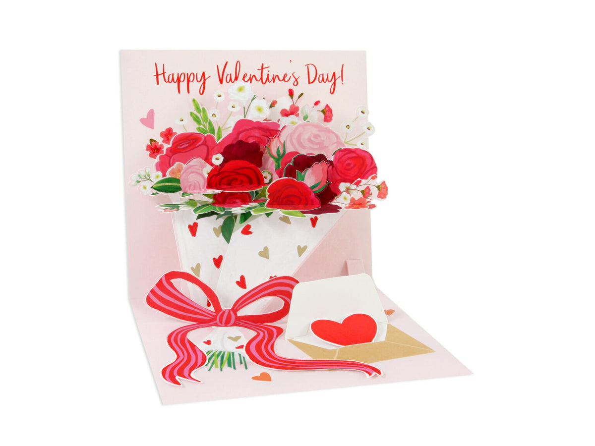 Red foil Valentine's Day card with white envelope inside copy reading Happy Valentine's Day.