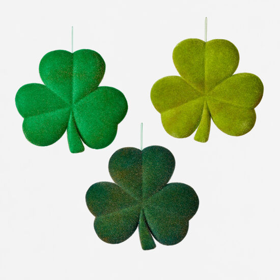 Green PVC flocked shamrock decoration sold individually.