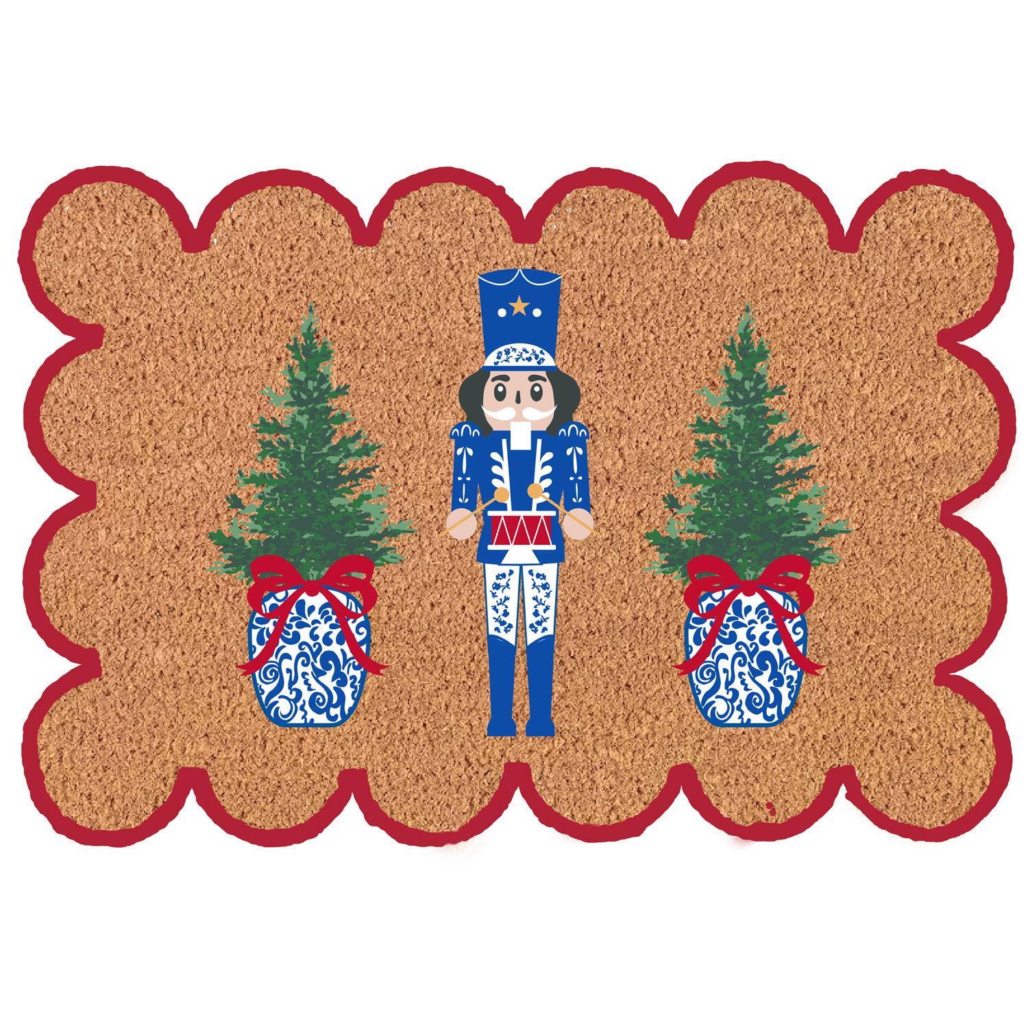 Scalloped coir doormat with a blue nutcracker between two Christmas trees in ginger jars.