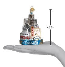 Chicago skyline Christmas ornament held in a hand, measuring 4.25 inches tall.