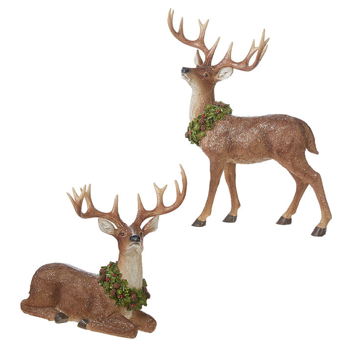 Resin deer figurine holding a wreath in brown tones with natural wood grain texture.